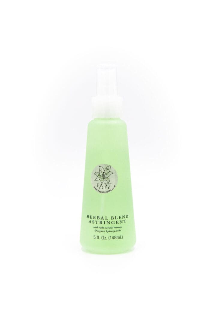 A bottle of facial cleanser with green label.
