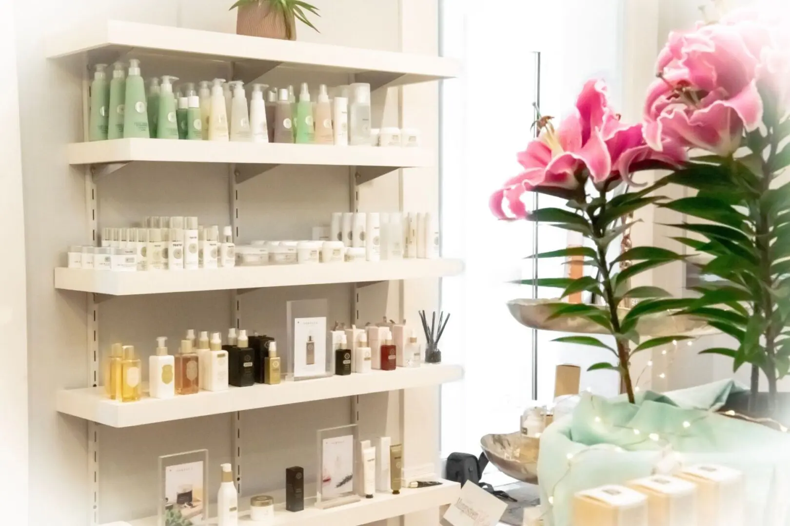 A room filled with shelves of beauty products.