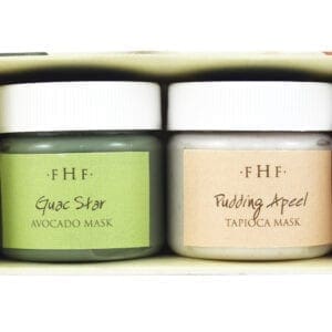 A couple of jars of face masks sitting on top of each other.