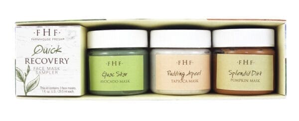 A couple of jars of face masks sitting on top of each other.