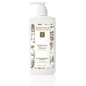 A bottle of body lotion with flowers on it.