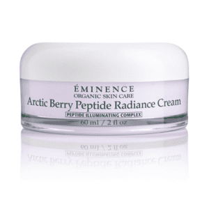 A white container of cream with the label eminence arctic berry peptide radiance cream.