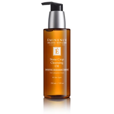 A bottle of facial cleansing oil with an orange label.