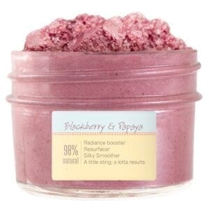 A jar of pink powder with the label " strawberry & thyme ".