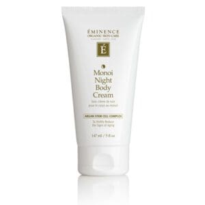 A white tube of body cream sitting on top of a table.