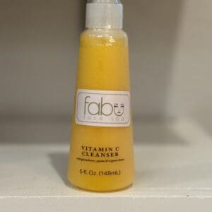 Vitamin C facial cleanser in pump bottle.